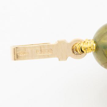 18K gold bracelet with peridot beads, Italy.
