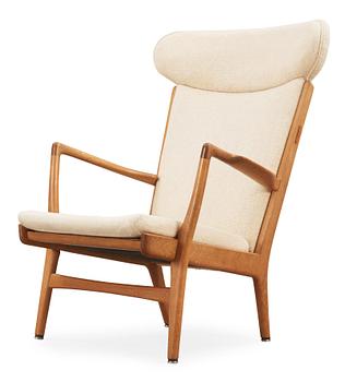 57. A Hans J Wegner "AP-15" oak armchair, AP-stolen, Denmark 1950-60's.