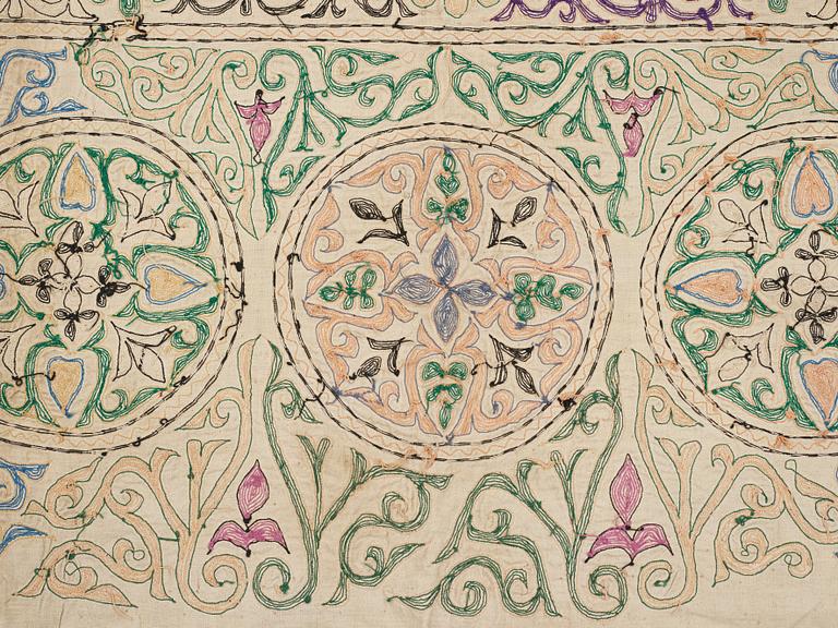 A Suzani textile, ca 247 x 128 cm.