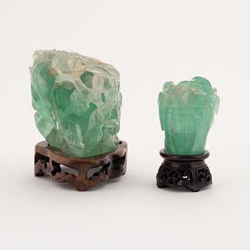 Two Chinese green stone sculptures, early 20th Century.