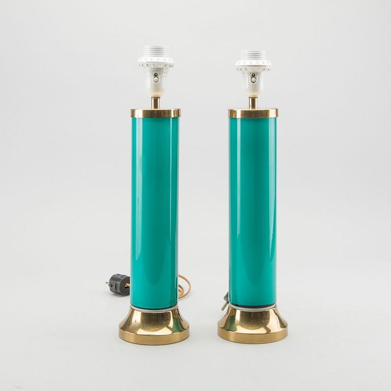 BERGBOM'S, a pair of brass and turquoise glass table lamps, Sweden mid 20th century,