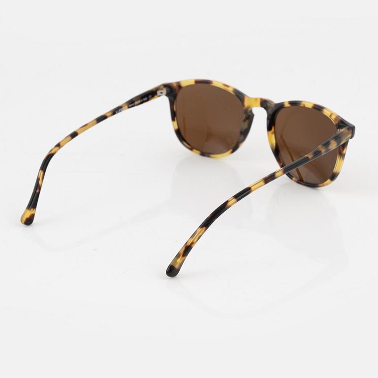 Illesteva, a pair of tortoise sunglasses.
