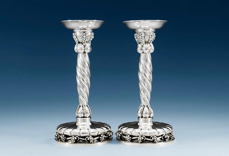 A PAIR OF GEORG JENSEN sterling candlesticks, Copenhagen 1945-77, design nr 264, Swedish import marks.