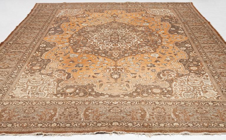 An antique Tabriz carpet, Northwest Persia, 453 x 310 cm.