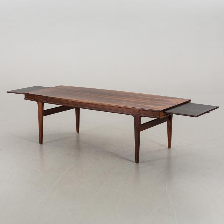 A Johannes Andersen sofa table.