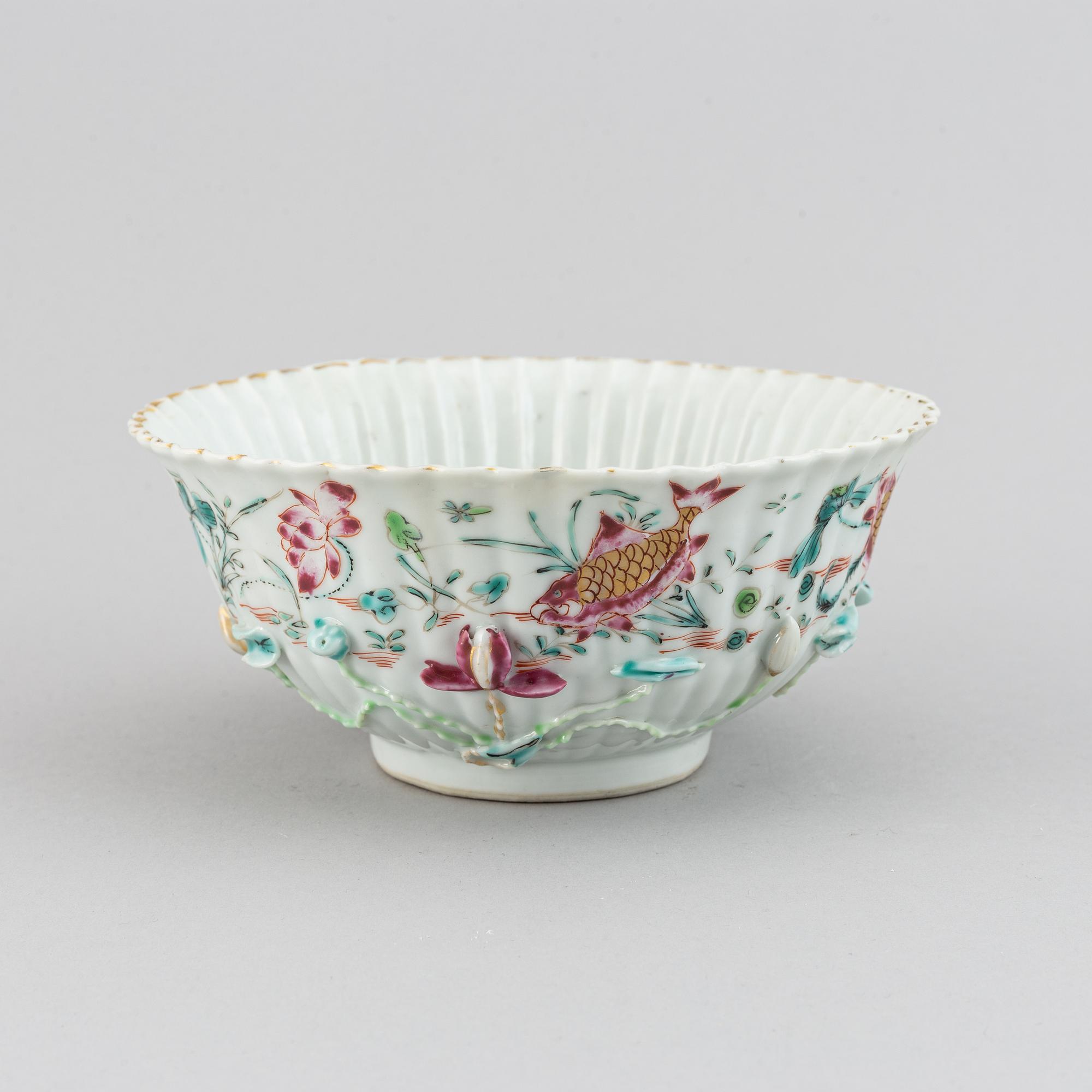 A famille rose relief moulded bowl, Qing dynasty, 18th century.