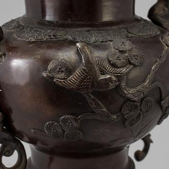 A Japanese bronze vase and cover, Meiji, late 19th century.