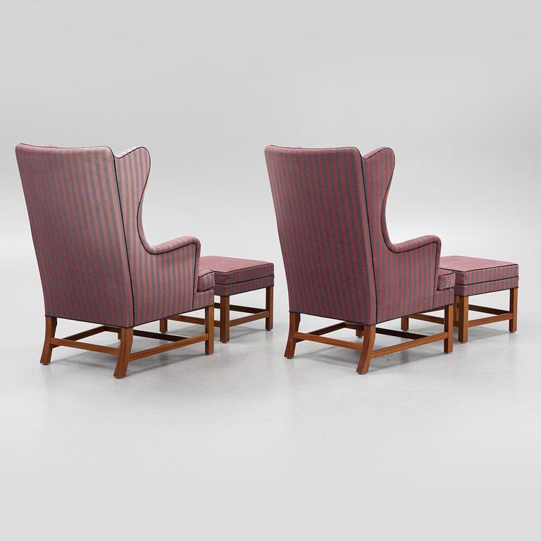 Kaare Klint, a pair of model 6212 armchairs with ottomans, Rud Rasmussen, Denmark.