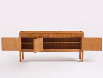 Axel Bäck, a Swedish Modern mahogany veneered sideboard, Eksjö Möbelfabrik, Sweden 1950, signed.