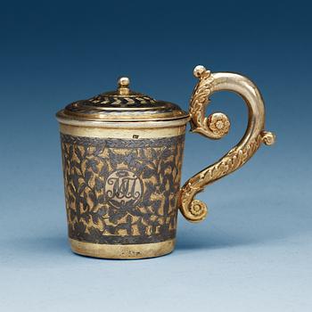 872. A Russian 19th century silver-gilt and niello cup and cover, unidentified makers mark, Moscow 1836.