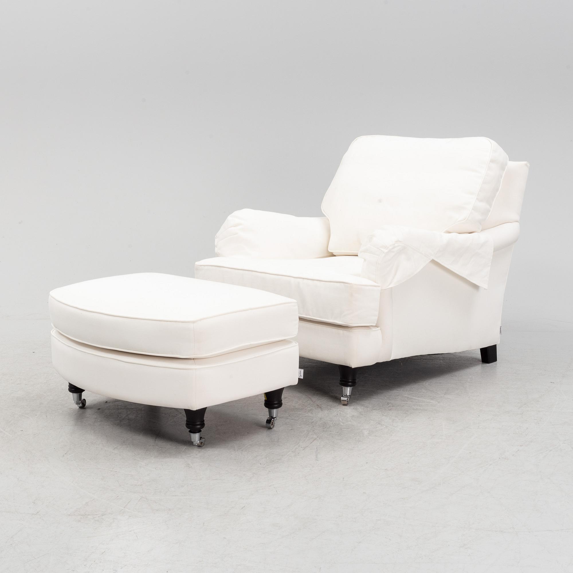 An easy chair with ottoman from Englesson, 21st century.