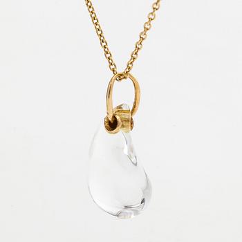 Tiffany & Co, Elsa Peretti, an 18K gold "Teardrop" necklace with a rock crystal pendant.