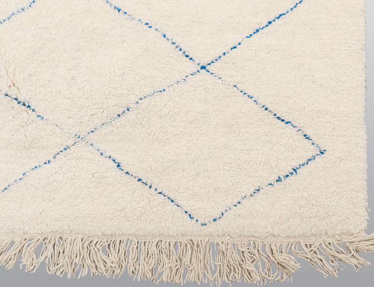 A moroccan carpet, ca 345 x 240 cm.