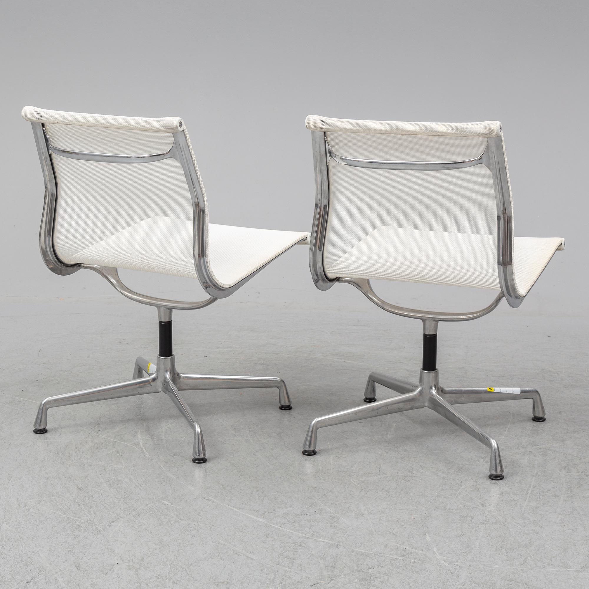 CHARLES & RAY EAMES, a pair of 'EA 101' chairs, Vitra.