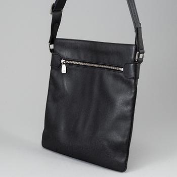 LOUIS VUITTON, a black Taiga bag, 2012.