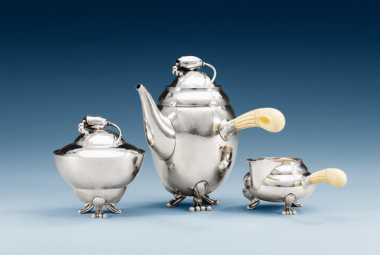 A Georg Jensen Blossom coffee service, Copenhagen 1915-19, 830/1000 silver.