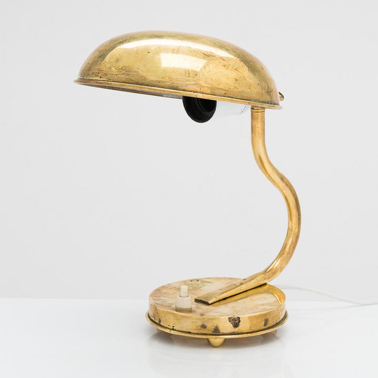A mid 20th century brass table lamp.