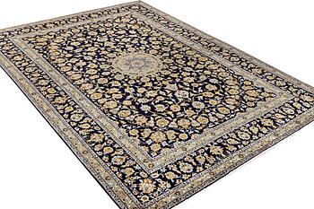 A Keshan carpet, c. 365 x 259 cm.