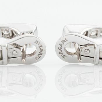 A pair of Bulgari "Parentesi" in 18K white gold with round brilliant-cut diamonds.