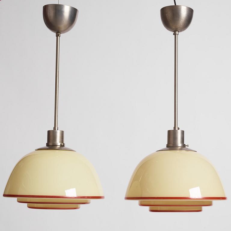Harald Notini, a pair of ceiling lamps, model "10701", Arvid Böhlmarks Lampfabrik, 1930s.