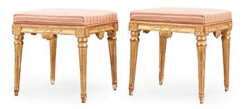 1555. A pair of Gustavian stools.