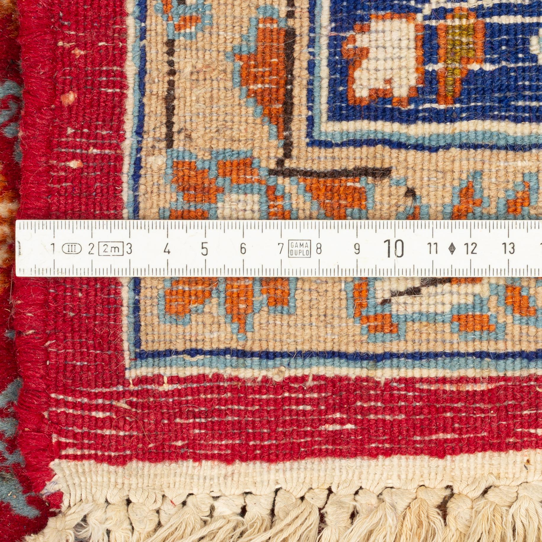 An oriental carpet, c. 290 x 198 cm.