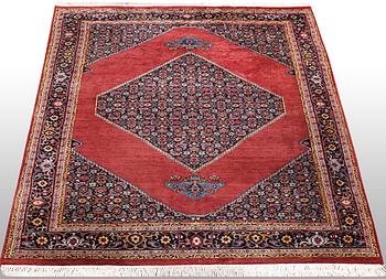A rug, Tabriz, ca 241 x 167 cm.