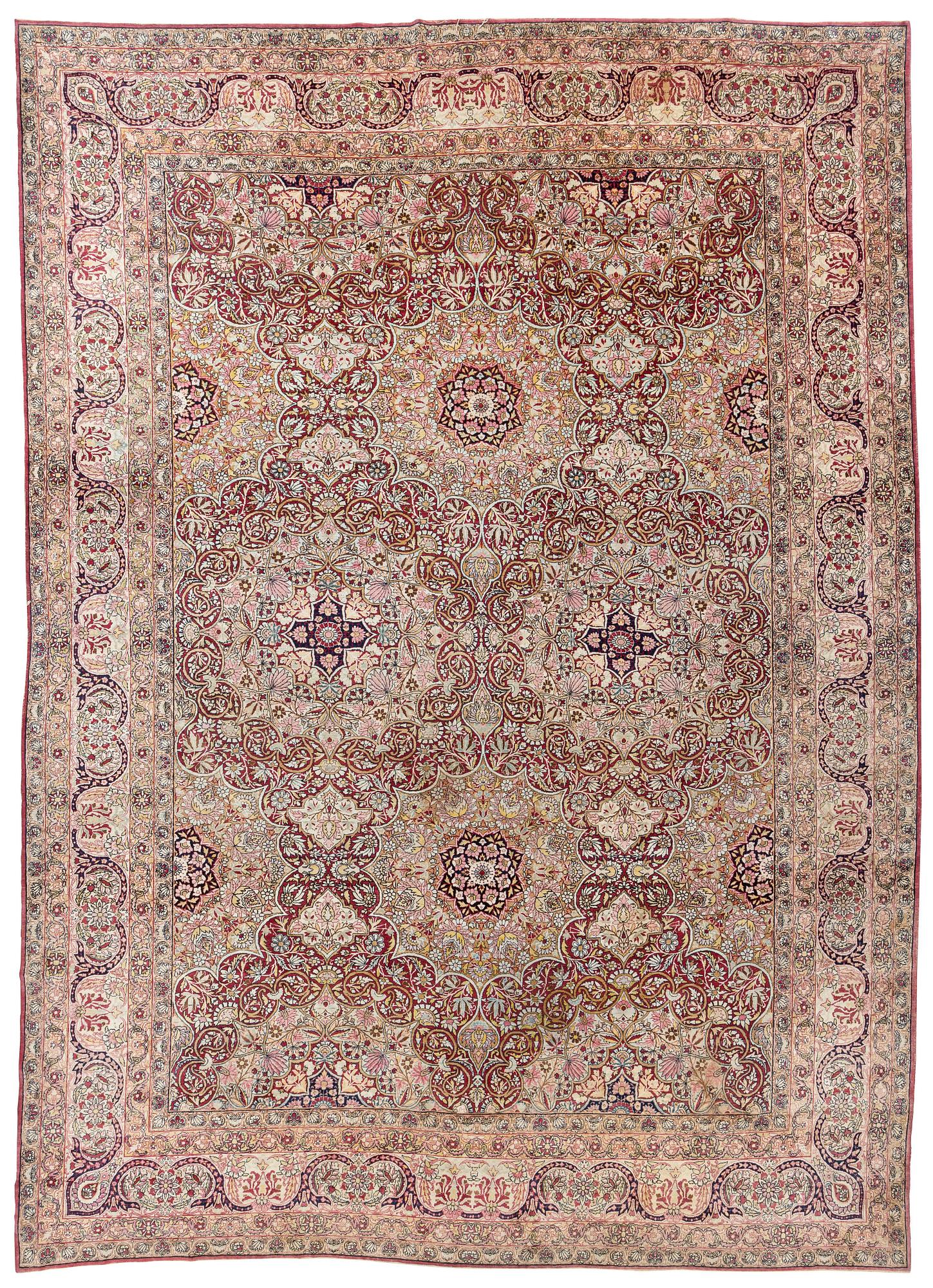 An antique Kerman Laver carpet, south east persia, ca 501 x 359 cm.