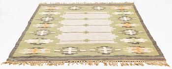 A flat weave carpet, signed JK, ca 237 x 173 cm.