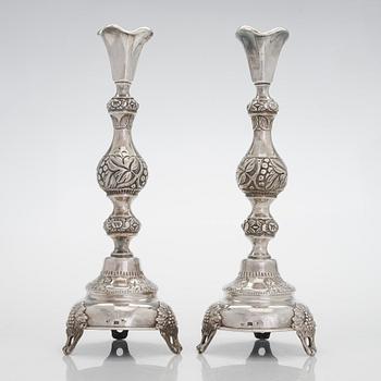 A pair of silver candlesticks from Warsaw, 1880s-90s. Unidentified Cyrillic maker mark FG.