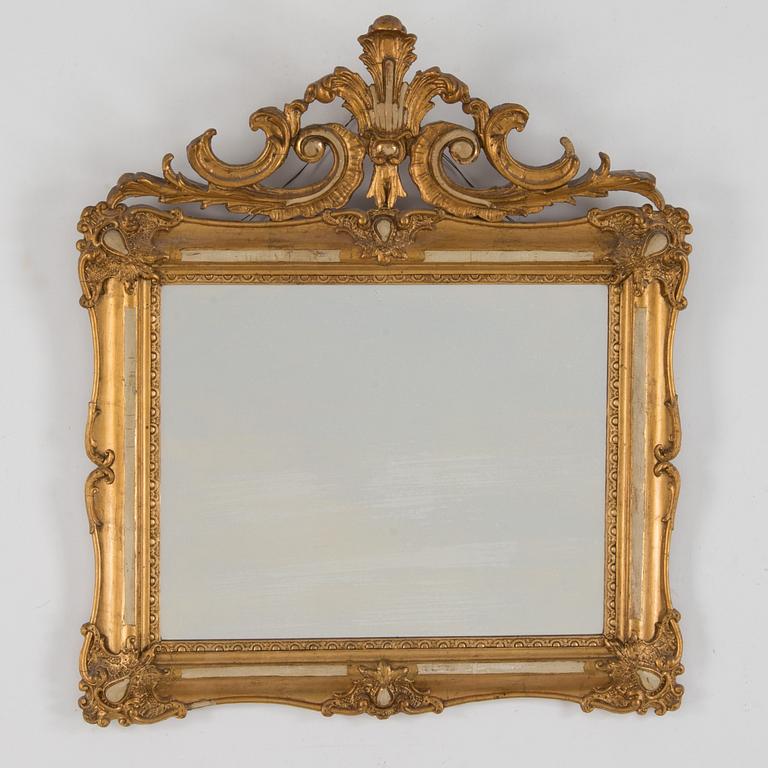 A 19th century rococo mirror.