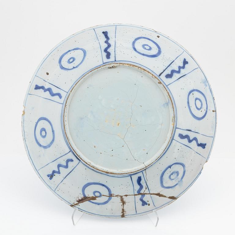 A Delft faience charger, 18th Century.