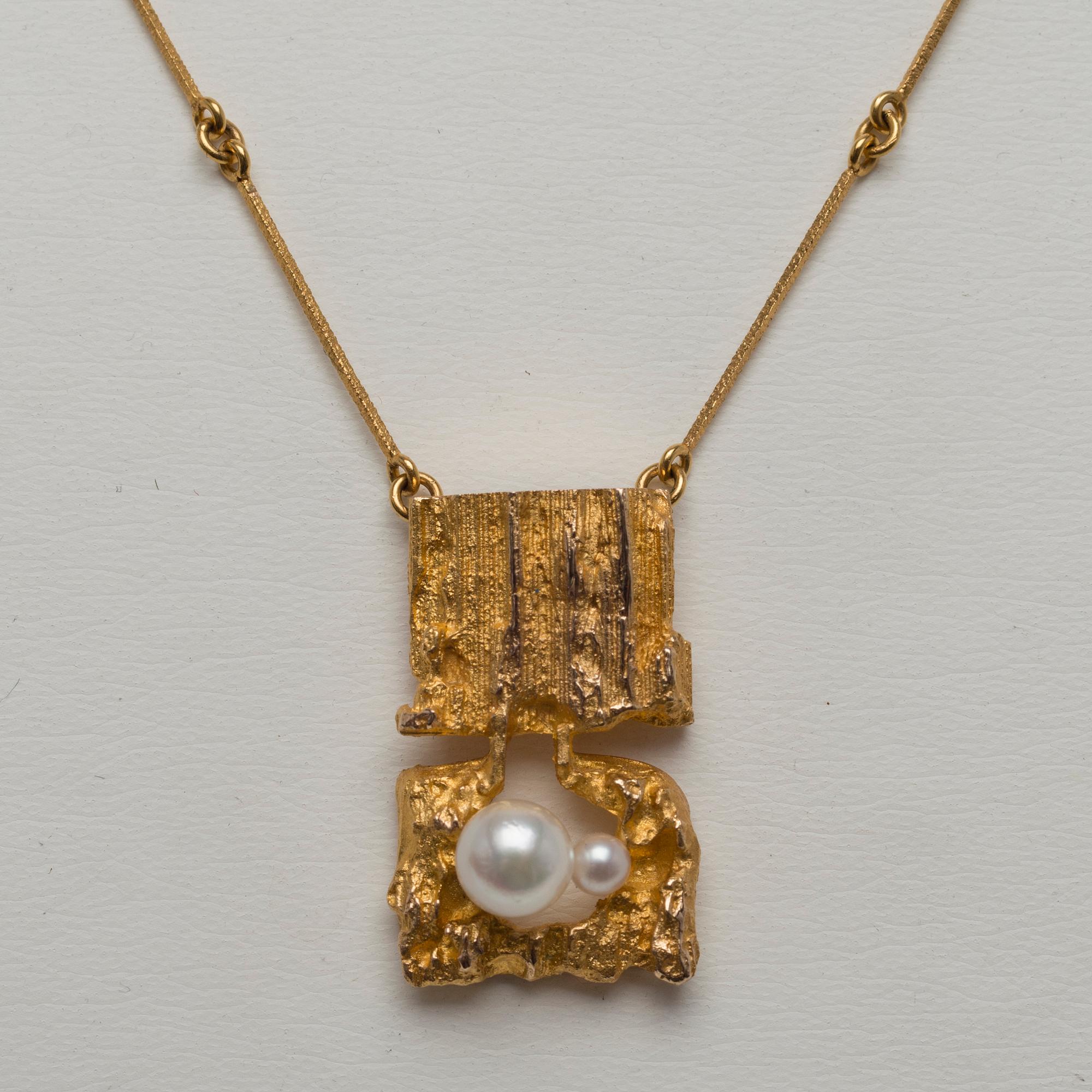 A NECKLACE, 14K gold, cultured pearls. Björn Weckström, Lapponia, Helsinki.