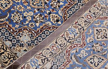 A carpet,  Nain, part silk, so-called 9 LAA, approx. 382 x 99 cm.