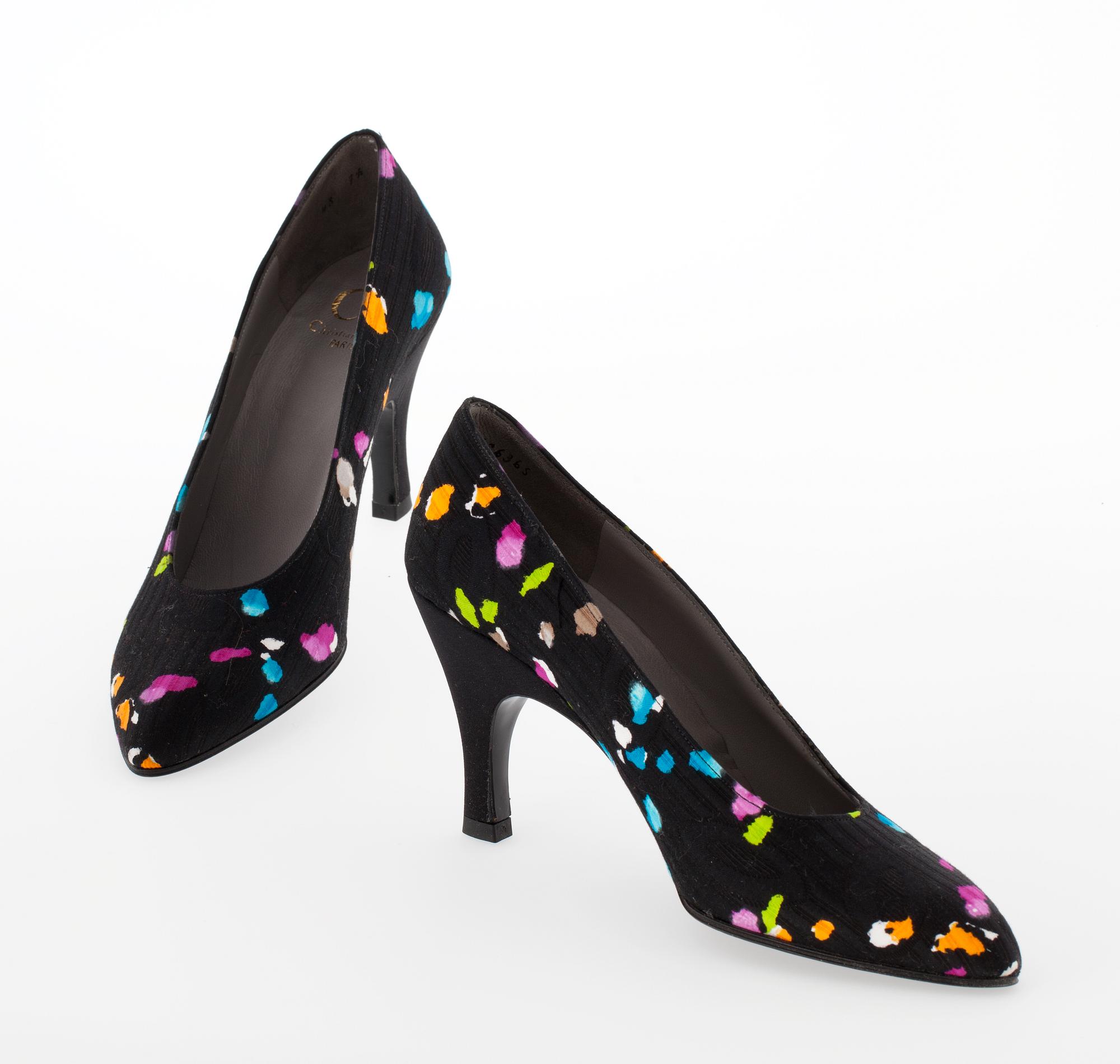 A pair of Christian Dior pumps.