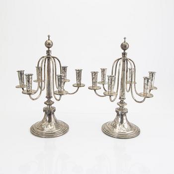 A Swedish 20th century pair of silver candelabras mark of CG Hallberg Stockholm 1928 possibly Elis Bergh.