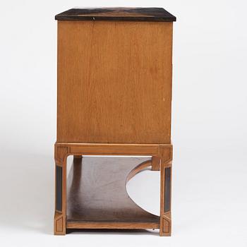 Carl Bergsten, an oak veneered sideboard/ chest of drawers, Nordiska Kompaniet Sweden 1923. Part of a set exhibited in Gothenburg 1923.