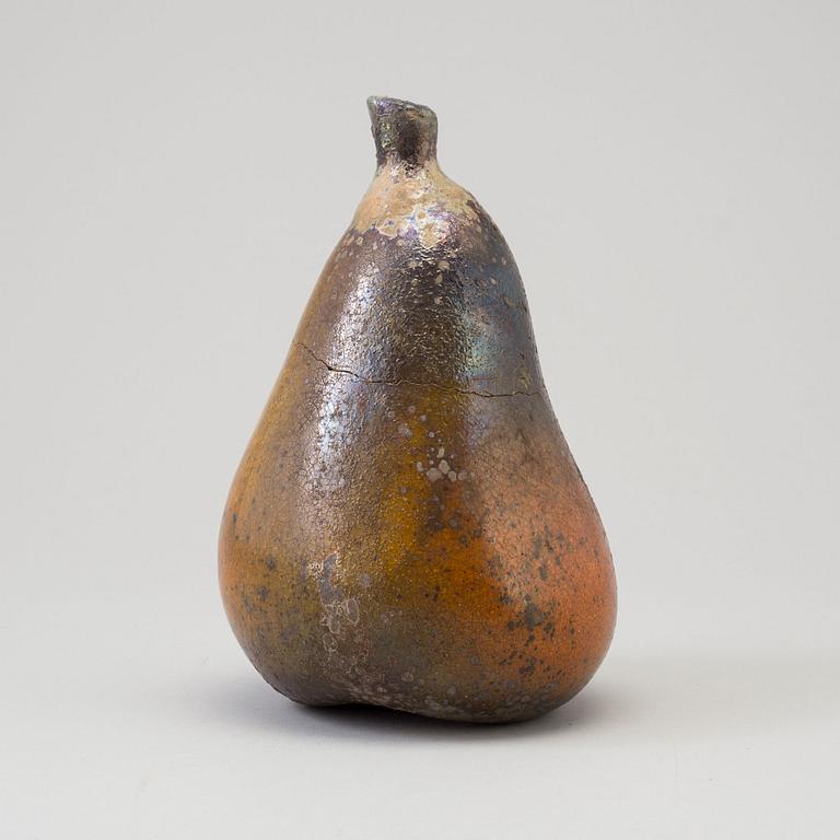 A Hans Hedberg fience sculpture of a pear, Biot, France.