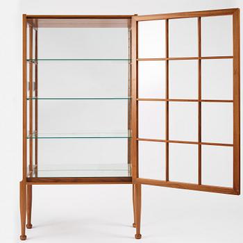 Josef Frank, a walnut display cabinet model "B 2217", Firma Svenskt Tenn, Sweden, 1950s-60s.