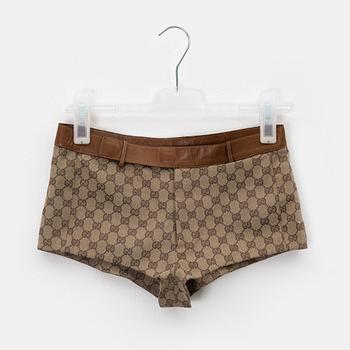 Gucci, a GG supreme jacket and shorts, size 38, 2000.