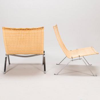 POUL KJAERHOLM, two 'PK-22' easy chairs, Fritz Hansen, Denmark 1999.