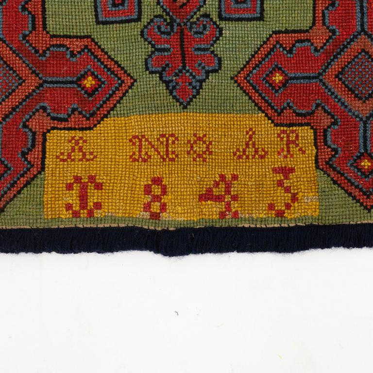 A carriage cushion, cross-stitch embroidered, Southwestern Scania, dated 1843.