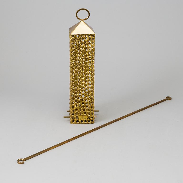 a brass ceiling light by Pierre Forsell for Skultuna.