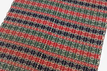 A bed cover in weft-patterned tabby type, c. 180 x 126, Scania, Sweden, first half of the 19th century.