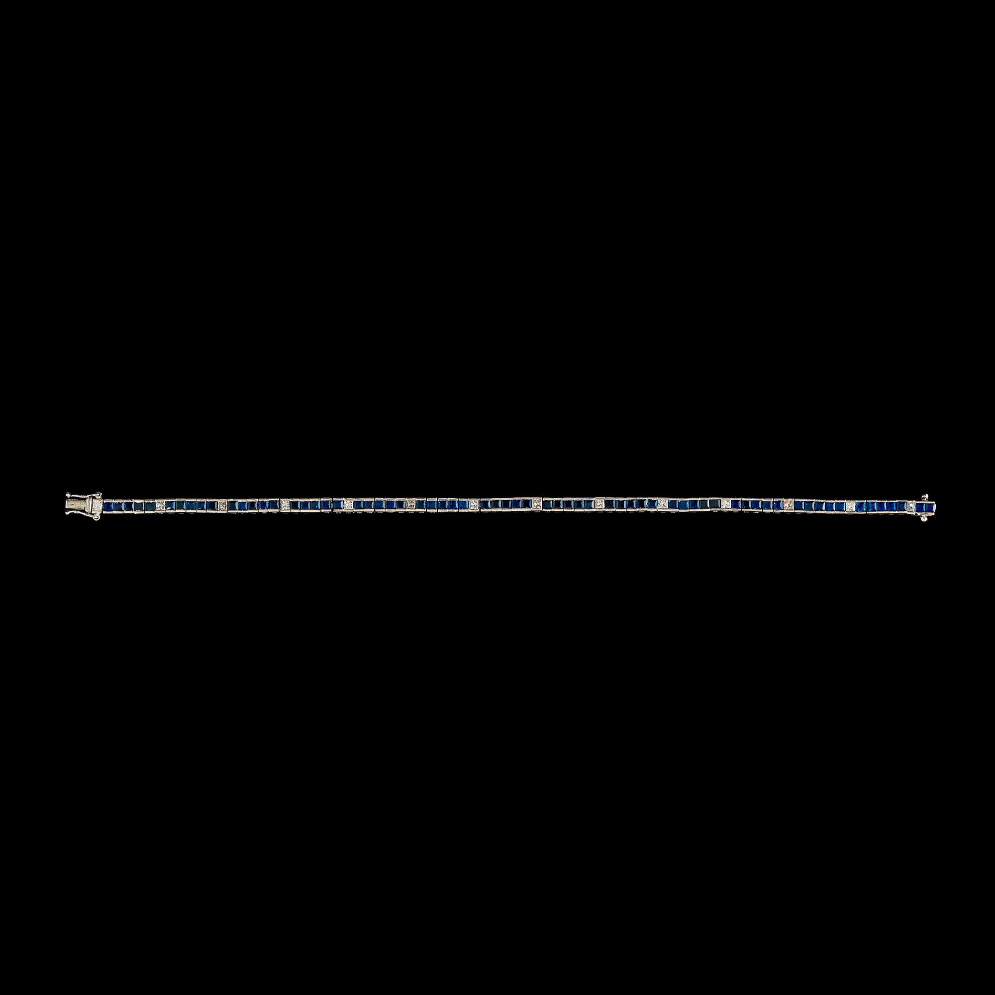 A princess-cut diamond and sapphire bracelet. Total diamond carat weight circa 0.70 ct.