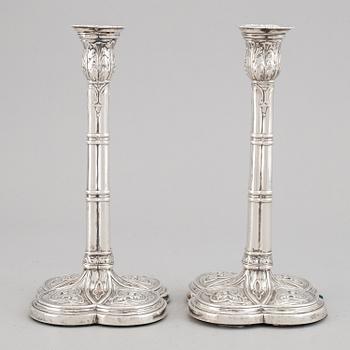 A pair of English 18th century silver candlesticks, marked JB, London 1766.