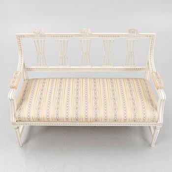 A sofa, three chairs and a table, Gustaivan style and of the Gustavian period, 19th-20th century.
