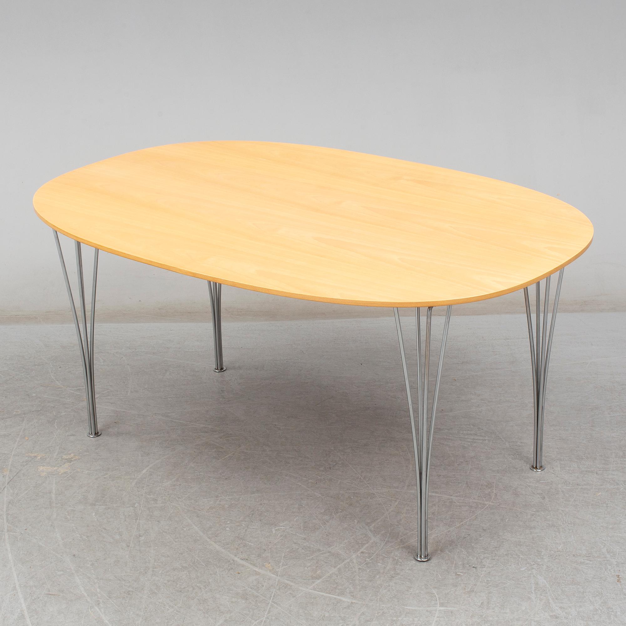 BRUNO MATHSSON & PIET HEIN, a "Superelips" table, Fritz Hansen, 1984.