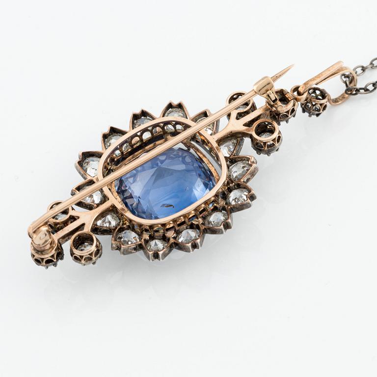 An gold and silver brooch/pendant with a sapphire and old-cut diamonds.