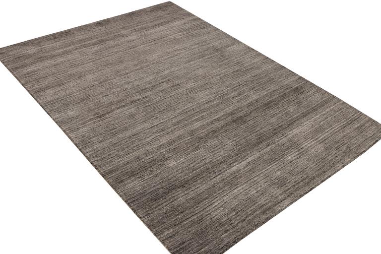 A rug, Lori, c. 242 x 121 cm.
